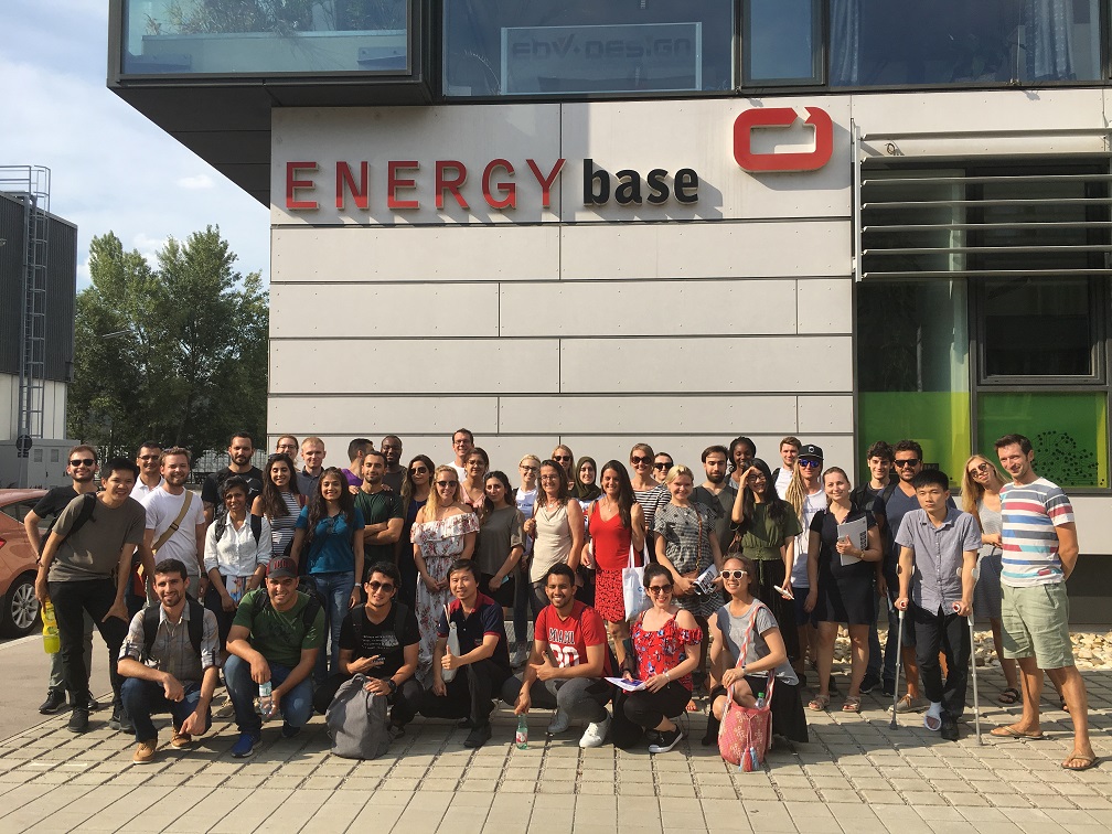 2018 Vienna Green.Building.Solutions. Summer University members with ECOB.Consulting's Philip Horn in front of the ENERGYbase building in Vienna.
Photo by AIT